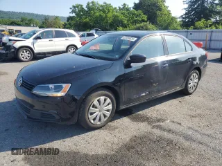 2014 Volkswagen Jetta S with VIN 3VW2K7AJ3EM399166, listed as a Copart auction lot 62009625 with 72,753 mi miles and Salvage title. Bid and sale history available at DreamBid. Image 1.