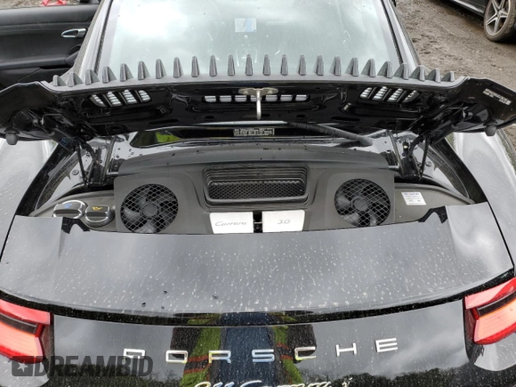 2018 Porsche 911 Carrera z VIN WP0AA2A93JS106166, wystawiony jako Copart lot #51105893 z przebiegiem 11 476 mil mil oraz . Historia ofert i sprzedaży dostępna na DreamBid. Obrazek 11.