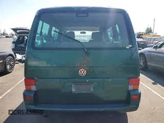2003 Volkswagen EuroVan с VIN WV2KB47043H001319, выставлен на аукционе Copart как лот 73758024 с пробегом 88 497 миль миль и Чистый • Clean title. История ставок и продаж доступна на DreamBid. Изображение 6.