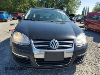 2010 Volkswagen Jetta S with VIN 3VWJZ7AJ1AM032185, listed as a Copart auction lot 58562615 with 189,752 mi miles and Salvage title. Bid and sale history available at DreamBid. Image 5.