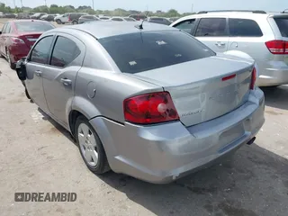 2014 Dodge Avenger SE with VIN 1C3CDZAB9EN143677, listed as a IAAI auction lot 42068802 with 142,134 mi miles and . Bid and sale history available at DreamBid. Image 3.