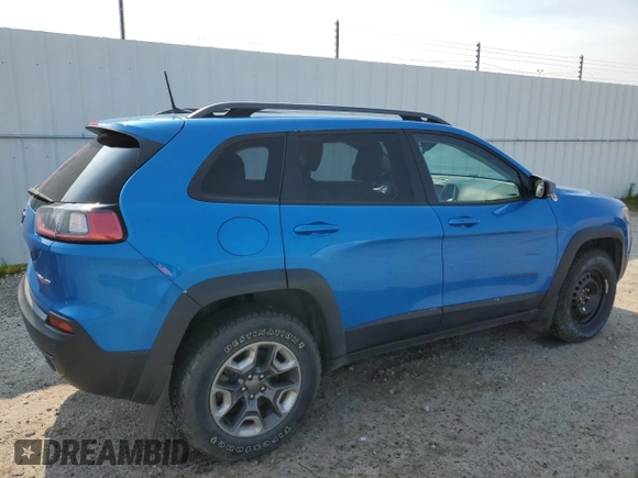 2019 Jeep Cherokee Trailhawk with VIN 1C4PJMBX7KD277477, listed as a Copart auction lot 58969705 with 139,521 mi miles and Salvage title. Bid and sale history available at DreamBid. Image 3.