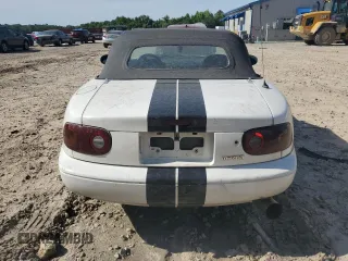 1991 Mazda MX-5 Miata Special Edition z VIN JM1NA3515M0231262, wystawiony jako Copart lot #57221675 z przebiegiem 241 670 mil mil oraz Szkoda całkowita • Salvage title. Historia ofert i sprzedaży dostępna na DreamBid. Obrazek 6.
