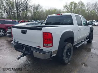 2010 GMC Sierra 1500 SLE with VIN 3GTRKVE31AG263130, listed as a IAAI auction lot 41903674 with 207,828 mi miles. Bid and sale history available at carsss.com. Image 4.