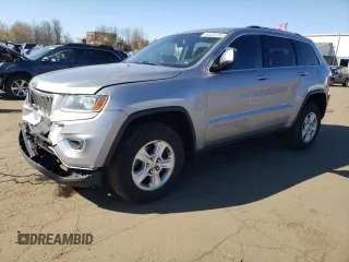 2014 Jeep Grand Cherokee Laredo with VIN 1C4RJFAG6EC230845, listed as a Copart auction lot 53528785 with 184,466 mi miles and Salvage Title. Bid and sale history available at DreamBid. Image 1.