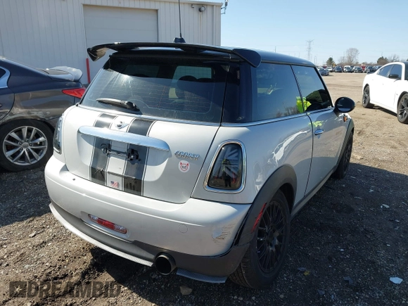 2013 MINI Cooper Hardtop with VIN WMWSU3C56DT683555, listed as a IAAI auction lot 41871323 with 102,527 mi miles. Bid and sale history available at carsss.com. Image 4.