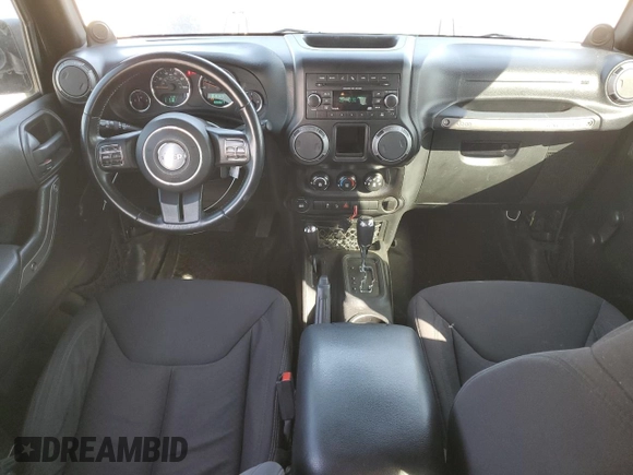 2013 Jeep Wrangler Unlimited Freedom z VIN 1C4BJWDG0DL513902, wystawiony jako Copart lot #52045975 z przebiegiem 166 827 mil mil oraz Szkoda całkowita • Salvage title. Historia ofert i sprzedaży dostępna na DreamBid. Obrazek 8.