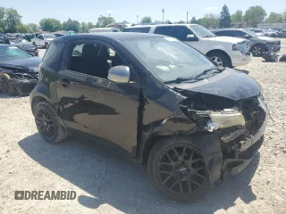 2012 Scion iQ z VIN JTNJJXB05CJ017720, wystawiony jako Copart lot #56152325 z przebiegiem 164 031 mil mil oraz Szkoda całkowita • Salvage title. Historia ofert i sprzedaży dostępna na DreamBid. Obrazek 4.