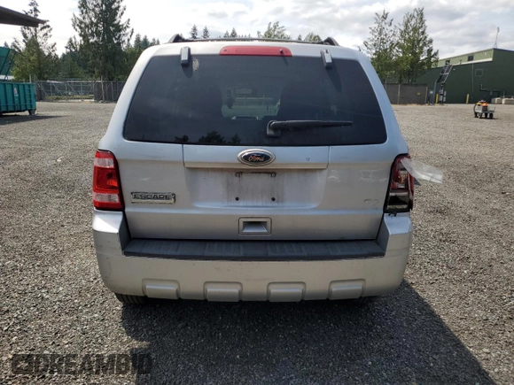 2011 Ford Escape XLS z VIN 1FMCU0C75BKA71501, wystawiony jako Copart lot #62614335 z przebiegiem 130 210 mil mil oraz Szkoda całkowita • Salvage title. Historia ofert i sprzedaży dostępna na DreamBid. Obrazek 6.