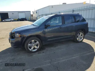 2015 Jeep Compass Limited with VIN 1C4NJDCB7FD177170, listed as a Copart auction lot 87464674 with 77,212 mi miles and Salvage Title. Bid and sale history available at carsss.com. Image 1.