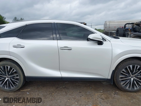 2023 Lexus RX 350 z VIN 2T2BAMBAXPC007570, wystawiony jako IAAI lot #41941157 z przebiegiem 74 026 mil mil oraz . Historia ofert i sprzedaży dostępna na DreamBid. Obrazek 13.