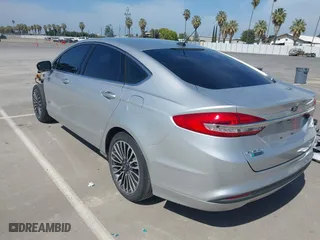 2017 Ford Fusion Energi SE with VIN 3FA6P0PU8HR242177, listed as a IAAI auction lot 42057898 with 119,435 mi miles. Bid and sale history available at carsss.com. Image 3.