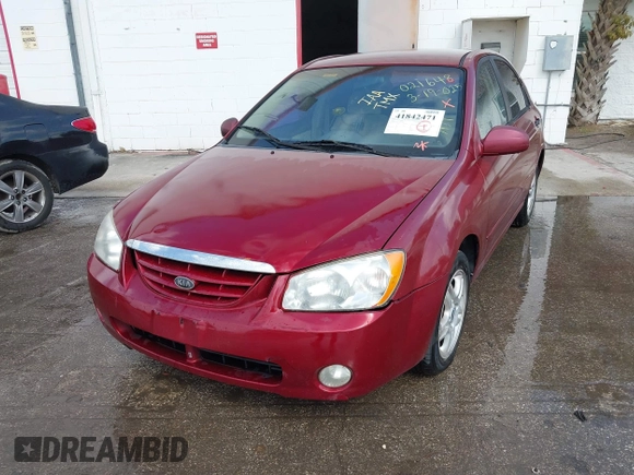 2004 Kia Spectra LX with VIN KNAFE121545021648, listed as a IAAI auction lot 41842471 with 211,436 mi miles. Bid and sale history available at carsss.com. Image 6.