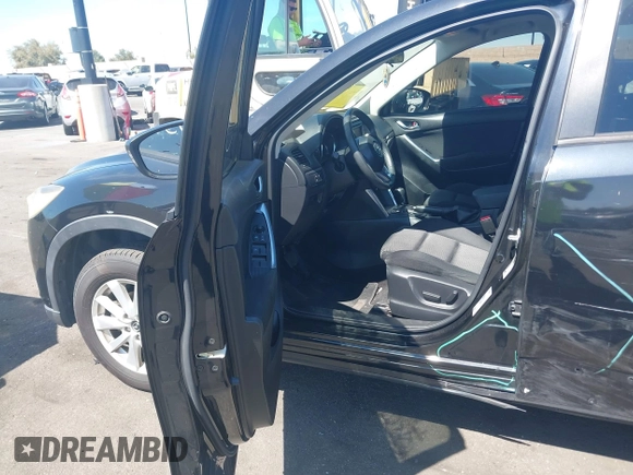 2013 Mazda CX-5 Touring with VIN JM3KE2CEXD0153589, listed as a IAAI auction lot 41855356 with 86,030 mi miles and . Bid and sale history available at DreamBid. Image 5.
