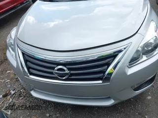 2014 Nissan Altima 2.5 S with VIN 1N4AL3AP5EN220856, listed as a IAAI auction lot 42176401 with 85,339 mi miles. Bid and sale history available at carsss.com. Image 6.