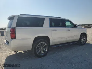 2018 Chevrolet Suburban Premier with VIN 1GNSCJKC9JR355511, listed as a Copart auction lot 75435744 with 79,192 mi miles and Salvage Title. Bid and sale history available at carsss.com. Image 3.