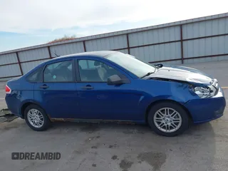 2009 Ford Focus SE with VIN 1FAHP35N39W176884, listed as a IAAI auction lot 41865864 with 193,747 mi miles. Bid and sale history available at carsss.com. Image 13.