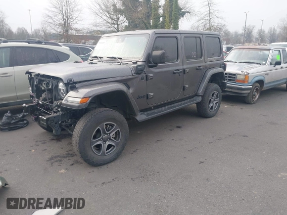 2021 Jeep Wrangler Unlimited Sahara z VIN 1C4JJXP68MW745098, wystawiony jako IAAI lot #41461092 z przebiegiem 36 410 mil mil oraz . Historia ofert i sprzedaży dostępna na DreamBid. Obrazek 2.