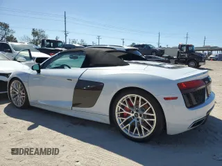 2018 Audi R8 z VIN WUAVACFX1J7900121, wystawiony jako Copart lot #75092964 z przebiegiem Nie podano mil oraz Szkody całkowita. Historia ofert i sprzedaży dostępna na DreamBid. Obrazek 2.