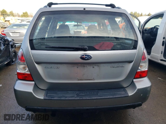 2007 Subaru Forester X with VIN JF1SG65677H717534, listed as a Copart auction lot 83818154 with 132,921 mi miles and Salvage title. Bid and sale history available at DreamBid. Image 6.