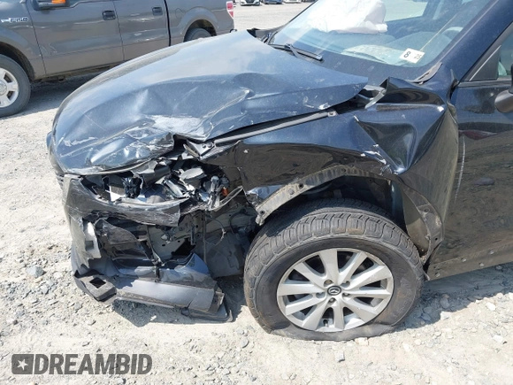 2014 Mazda CX-5 Sport with VIN JM3KE2BE3E0405976, listed as a IAAI auction lot 42161069 with 66,301 mi miles and . Bid and sale history available at carsss.com. Image 6.