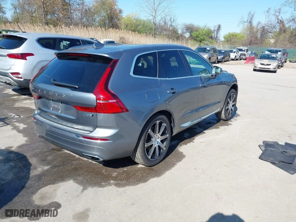 2020 Volvo XC60 Inscription with VIN YV4102RL5L1490699, listed as a IAAI auction lot 41962007 with 56,607 mi miles. Bid and sale history available at carsss.com. Image 4.