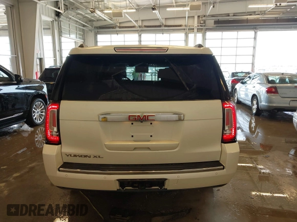 2015 GMC Yukon XL Denali with VIN 1GKS2JKJXFR528927, listed as a IAAI auction lot 41391259 with 159,467 mi miles. Bid and sale history available at carsss.com. Image 16.