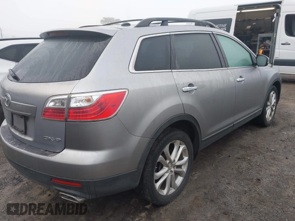 2011 Mazda CX-9 Grand Touring with VIN JM3TB3DA8B0312069, listed as a IAAI auction lot 41793398 with 185,381 mi miles. Bid and sale history available at carsss.com. Image 4.