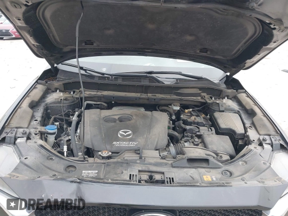2017 Mazda CX-5 Grand Touring with VIN JM3KFADL9H0110985, listed as a IAAI auction lot 41435143 with 88,208 mi miles. Bid and sale history available at carsss.com. Image 10.