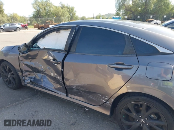 2019 Honda Civic Sedan Sport with VIN 2HGFC2F8XKH557203, listed as a IAAI auction lot 41846429 with 105,598 mi miles. Bid and sale history available at carsss.com. Image 6.