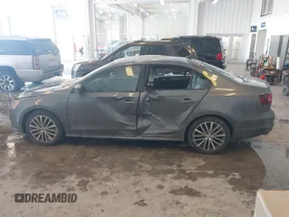 2016 Volkswagen Jetta Sport z VIN 3VWD17AJ9GM250243, wystawiony jako IAAI lot #41618054 z przebiegiem 38 520 mil mil oraz . Historia ofert i sprzedaży dostępna na DreamBid. Obrazek 14.