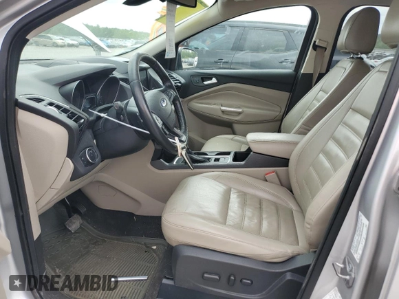 2017 Ford Escape Titanium with VIN 1FMCU0J96HUC12822, listed as a Copart auction lot 54259375 with 127,114 mi miles and Salvage Title. Bid and sale history available at DreamBid. Image 7.