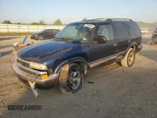 1999 Chevrolet Blazer LS z VIN 1GNCS13W9X2194269, wystawiony jako Copart lot #75468004 z przebiegiem 154 501 mil mil oraz Szkoda całkowita • Salvage title. Historia ofert i sprzedaży dostępna na DreamBid. Obrazek 1.