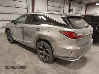 2018 Lexus RX 350L Premium z VIN JTJDZKCA6J2004385, wystawiony jako IAAI lot #41382429 z przebiegiem 111 638 mil mil oraz . Historia ofert i sprzedaży dostępna na DreamBid. Obrazek 3.