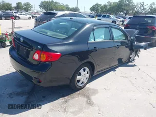 2010 Toyota Corolla with VIN 2T1BU4EE6AC533356, listed as a IAAI auction lot 41991922 with 117,555 mi miles. Bid and sale history available at carsss.com. Image 4.