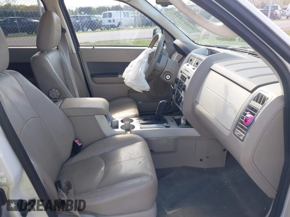 2010 Mercury Mariner Premier with VIN 4M2CN9H7XAKJ26886, listed as a IAAI auction lot 42027825 with 149,561 mi miles and . Bid and sale history available at DreamBid. Image 5.