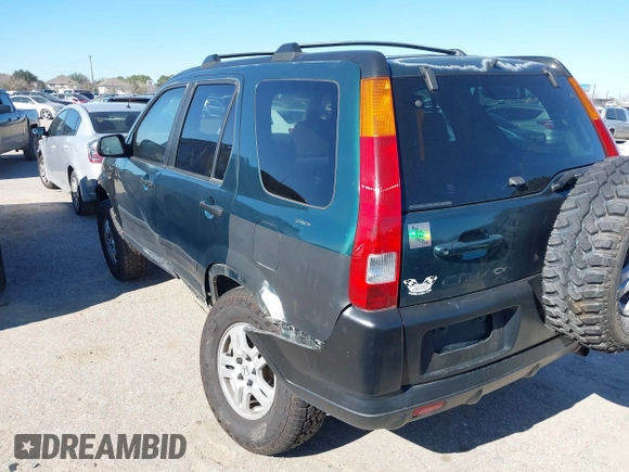 2002 Honda CR-V EX with VIN JHLRD78842C040973, listed as a IAAI auction lot 41214880 with 153,429 mi miles and . Bid and sale history available at DreamBid. Image 3.