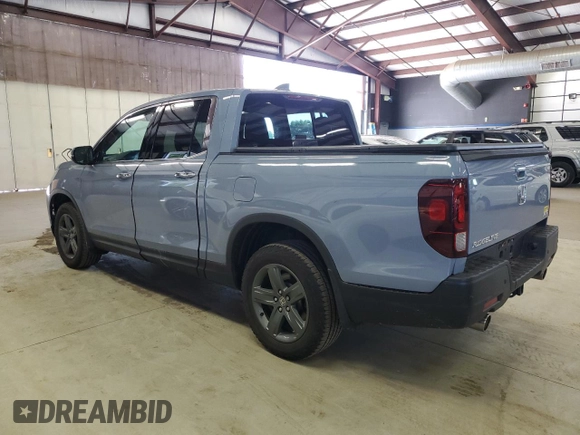 2023 Honda Ridgeline RTL-E with VIN 5FPYK3F77PB001460, listed as a Copart auction lot 61383785 with 27,423 mi miles and Salvage title. Bid and sale history available at DreamBid. Image 2.