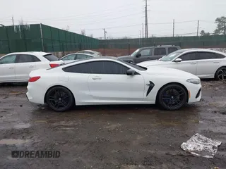 2020 BMW M8 with VIN WBSAE0C0XLCD33970, listed as a IAAI auction lot 41489149 with 44,176 mi miles. Bid and sale history available at carsss.com. Image 13.