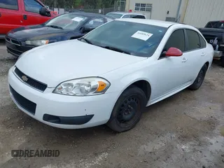 2014 Chevrolet Impala Limited Police Police with VIN 2G1WD5E31E1185243, listed as a IAAI auction lot 41685624 with 131,335 mi miles. Bid and sale history available at carsss.com. Image 2.