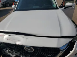 2024 Mazda CX-90 Premium z VIN JM3KKDHD5R1189566, wystawiony jako Copart lot #53689405 z przebiegiem Nie podano mil oraz Szkoda całkowita • Salvage title. Historia ofert i sprzedaży dostępna na DreamBid. Obrazek 13.