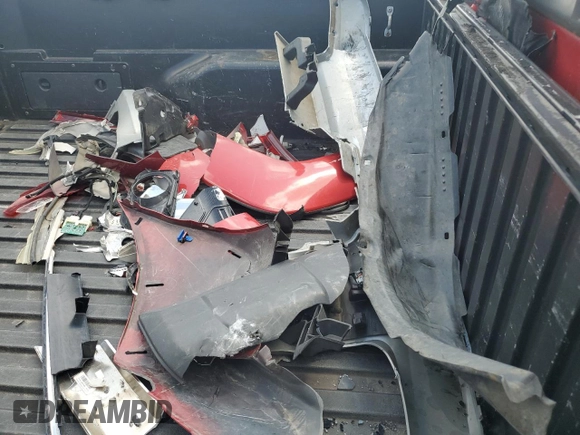 2015 Toyota Tacoma with VIN 3TMLU4EN9FM165421, listed as a Copart auction lot 58547985 with 136,372 mi miles and Salvage title. Bid and sale history available at DreamBid. Image 12.