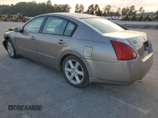 2004 Nissan Maxima SE with VIN 1N4BA41E24C878448, listed as a Copart auction lot 72596984 with 329,525 mi miles and Salvage Title. Bid and sale history available at carsss.com. Image 2.