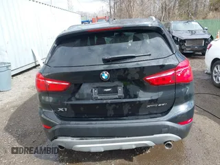 2018 BMW X1 xDrive28i z VIN WBXHT3C35J5L34646, wystawiony jako IAAI lot #41725131 z przebiegiem 81 983 mil mil oraz . Historia ofert i sprzedaży dostępna na DreamBid. Obrazek 16.