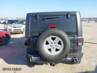 2017 Jeep Wrangler Unlimited Sport with VIN 1C4BJWDG4HL634468, listed as a IAAI auction lot 41668747 with 88,691 mi miles. Bid and sale history available at carsss.com. Image 16.