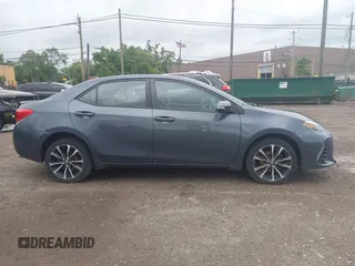 2017 Toyota Corolla L z VIN 5YFBURHE7HP633484, wystawiony jako IAAI lot #42538243 z przebiegiem 80 492 mil mil oraz . Historia ofert i sprzedaży dostępna na DreamBid. Obrazek 13.