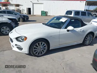 2018 FIAT 124 Spider Classica z VIN JC1NFAEKXJ0138258, wystawiony jako IAAI lot #42174771 z przebiegiem 42 867 mil mil oraz . Historia ofert i sprzedaży dostępna na DreamBid. Obrazek 14.
