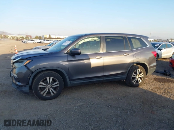2017 Honda Pilot EX-L with VIN 5FNYF5H74HB010026, listed as a IAAI auction lot 41633770 with 170,383 mi miles and . Bid and sale history available at DreamBid. Image 15.