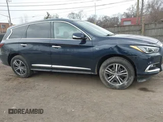 2019 Infiniti QX60 Luxe with VIN 5N1DL0MM1KC566946, listed as a IAAI auction lot 41887596 with 108,035 mi miles and . Bid and sale history available at DreamBid. Image 13.