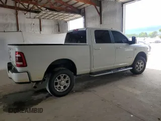 2023 Ram 2500 Laramie with VIN 3C6UR5FL2PG632162, listed as a Copart auction lot 56220575 with 59,902 mi miles and Salvage title. Bid and sale history available at DreamBid. Image 3.